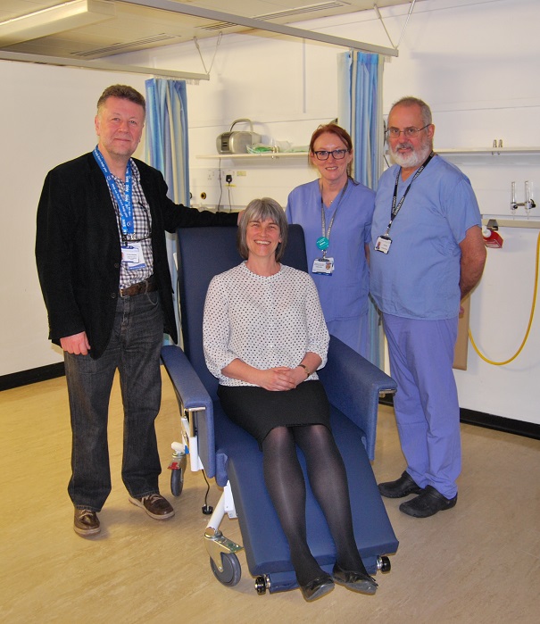 Harry Walmsley, Chairman of the Friends of Eastbourne Hospital presents chair.