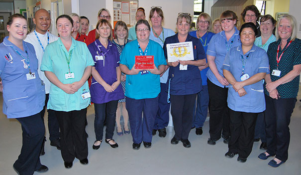 Gardner Ward presented with their award by Director of Nursing, Alice Webster