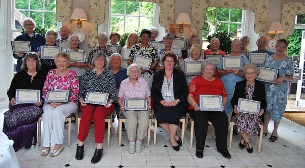 Volunteers with Alice Webster, Director of Nursing