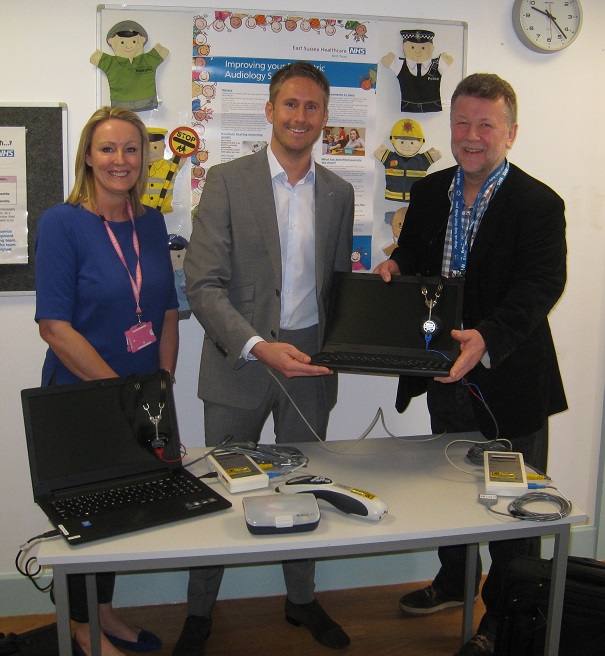 Ronda Prater, Newborn Screening Programme, James Penfold, Paediatric Audiology Clinical Lead receives donation from Harry Walmsley, Chairman of The Friends of Eastbourne Hospital