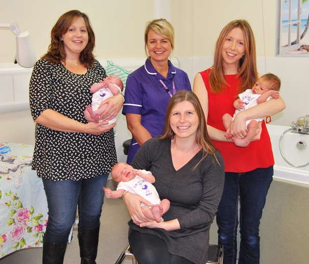 Midwives with their babies