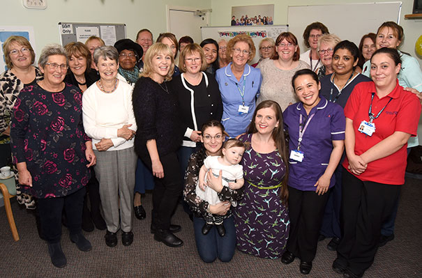 Kathy Smith (centre) with colleagues past and present