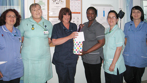 Staff on Hailsham 3 with Link Facilitator Trish Hare (3rd from left ) and Florence Mpofu (4th from, left ) Senior ICN Community Services & Urgent Care Lead