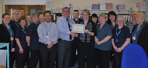 Chairman David Clayton-Smith with Health Records staff at Eastbourne DGH
