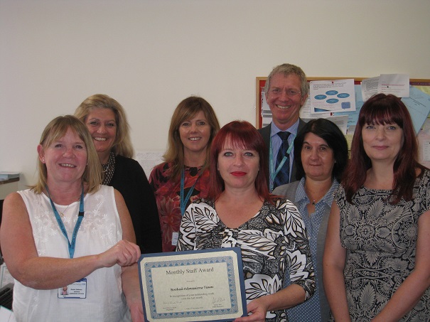 Chief Executive Adrian Bull with the team at Conquest Hospital