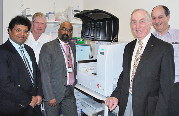 Consultant Breast Surgeons and Peter Nash from the Eastbourne Hospital Friends (second right) with OSNA machine