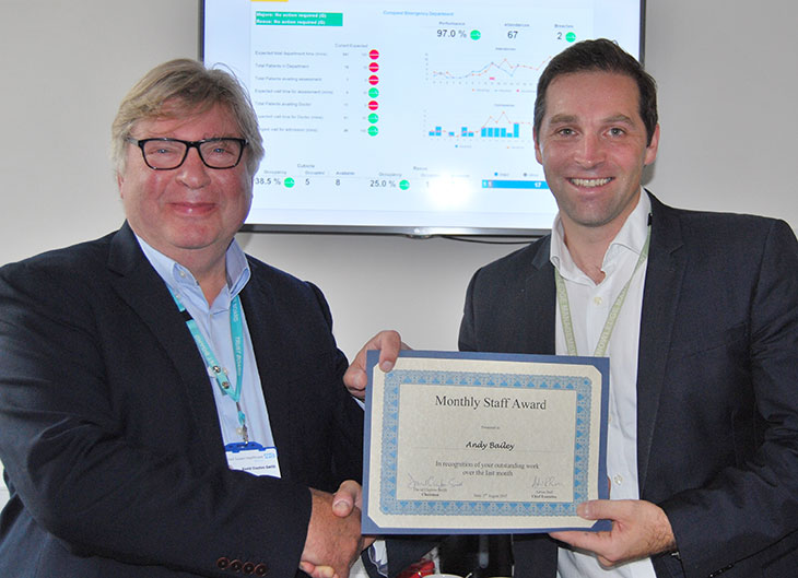 Andy Bailey, Information Manager receives his award from David Clayton-Smith, Chairman 