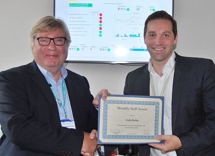 Andy Bailey, Information Manager receives his award from David Clayton-Smith, Chairman