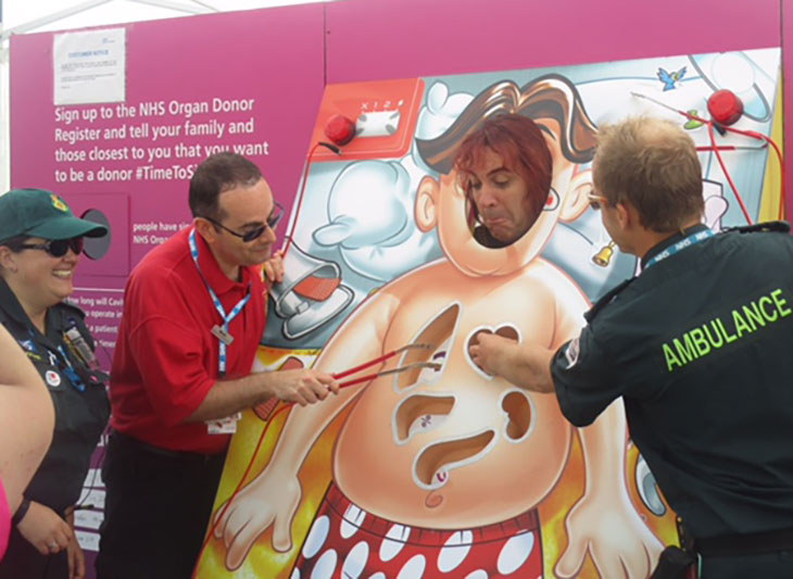 People enjoying playing 'Operation Donation' at Airbourne