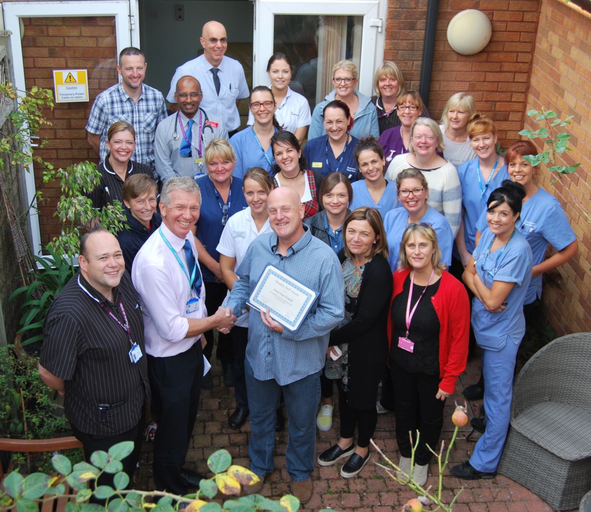 Matron Dave Fox-Dossett with Chief Executive Adrian Bull and the Emergency Department Team 