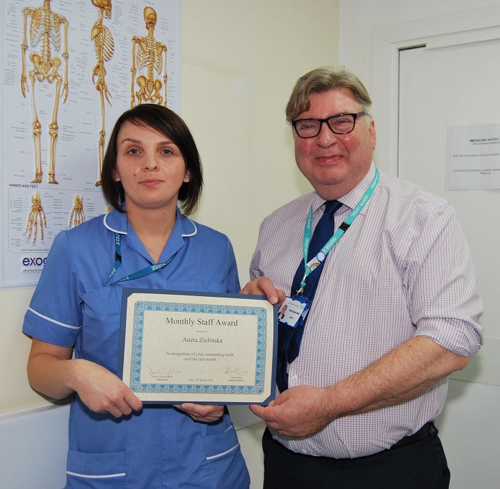 Staff Nurse Aneta Zielinska with Chairman, David Clayton-Smith