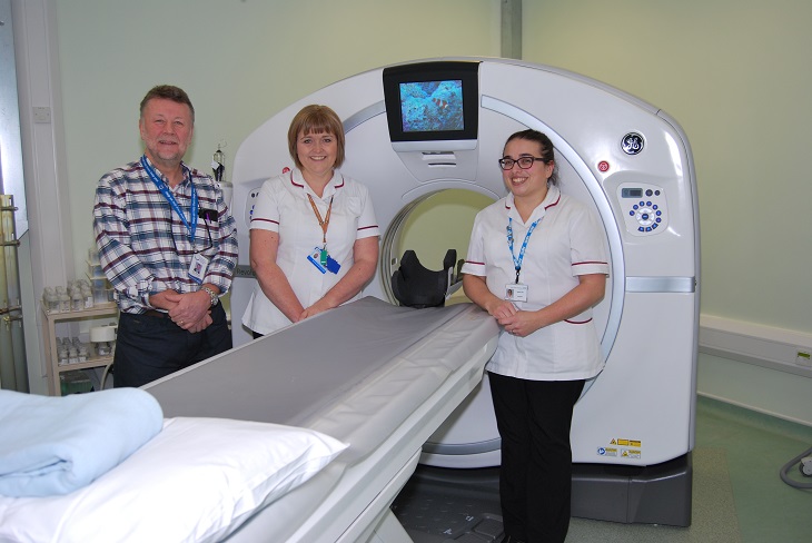 Harry Walmsley, Chairman of the Friends of Eastbourne Hospital with Rebecca Ayling, Clinical Manager CT and Helena Old, Senior Radiographer