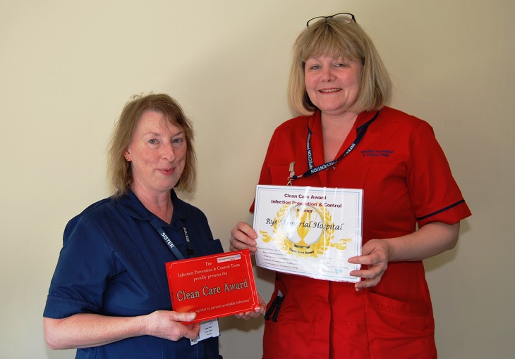 Ward Sister Tricia Blunt is presented with the award by Helen Tingley Infection Control Nurse