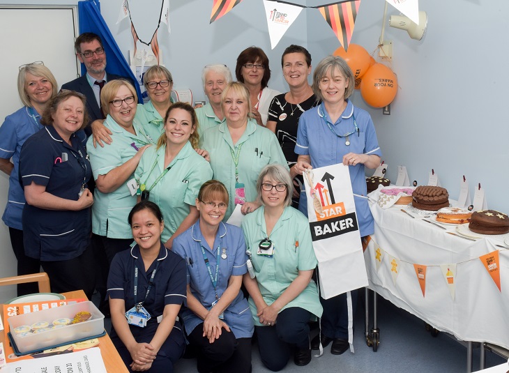 Outpatient team with judges Vikki Carruth, Director of Nursing and Jonathan Reid, Director of Finance