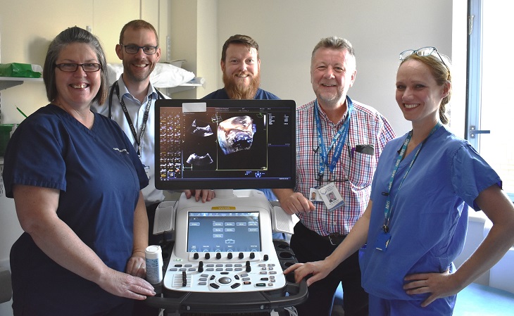 Dr Andrew Marshall, Consultant Cardiologist with the new Echocardiography machine and Harry Walmsley, Chairman of Friends