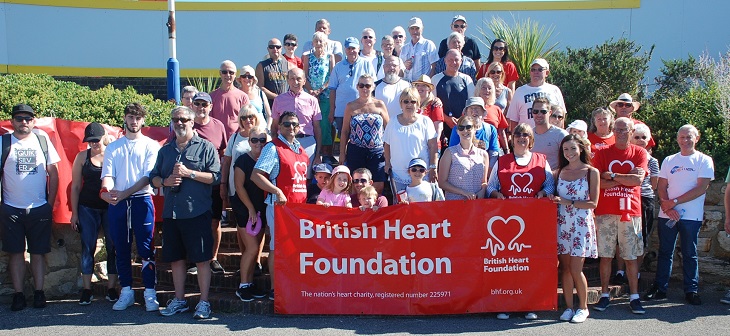 Nikhil Patel, Consultant Cardiologist and Phillippa Acton, Cardiac Rehabilitation Specialist Sister with group of walkers