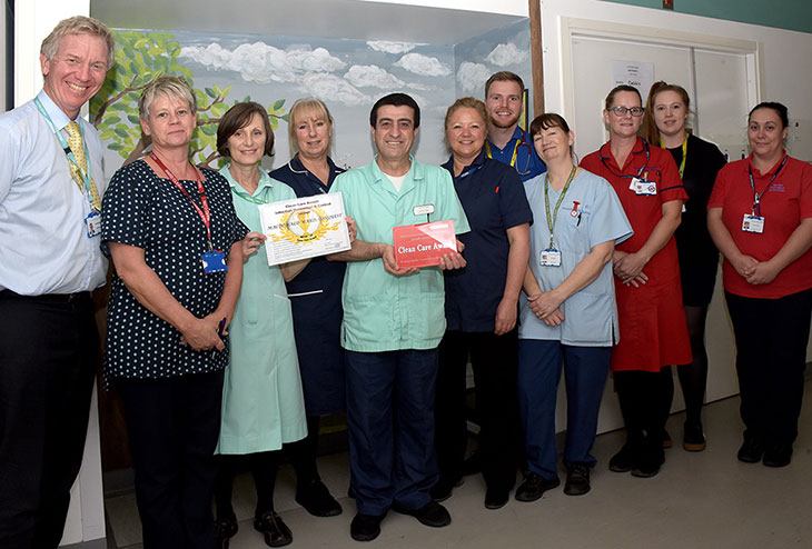MacDonald Ward team at Conquest Hospital presented with their award