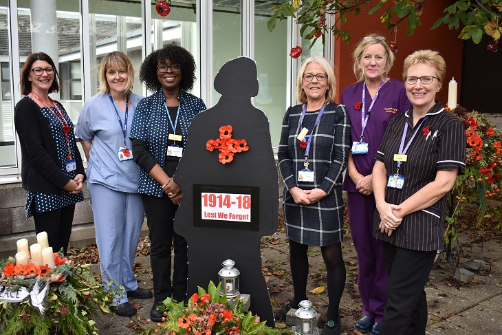 Critical Care team and Critical Care Lead Nurse Pauline Simes with their remembrance display