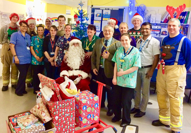 East Sussex Fire and Rescue presenting presents to Kipling Ward