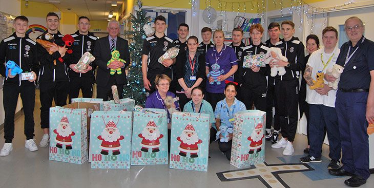 Hastings United Football Club presenting presents to Kipling Ward