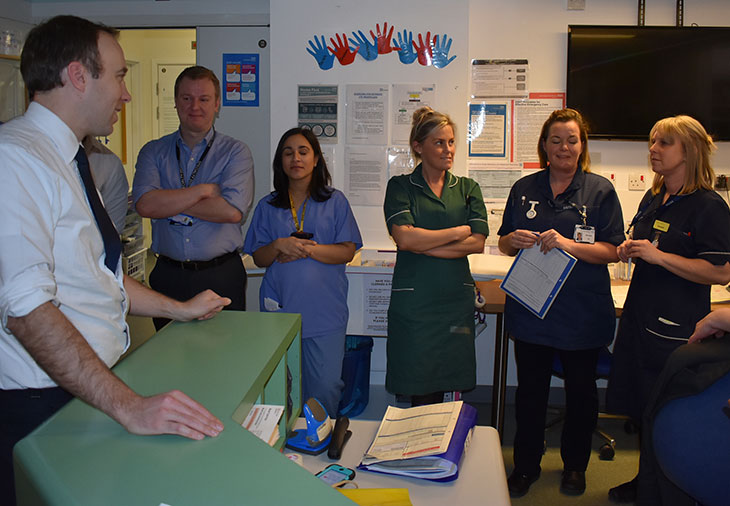 Secretary of State for Health and Social Care, Matt Hancock speaking with staff on the Richard Ticehurst Surgical Unit at Conquest Hospital