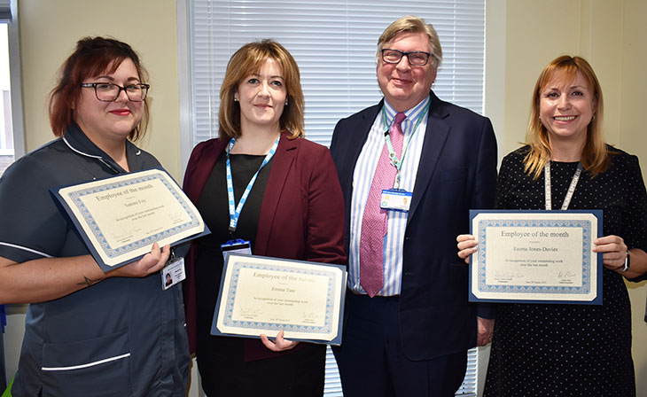 Sammi Foy, Emma Tate and Emma Jones-Davies receiving their award from former Chairman David Clayton-Smith