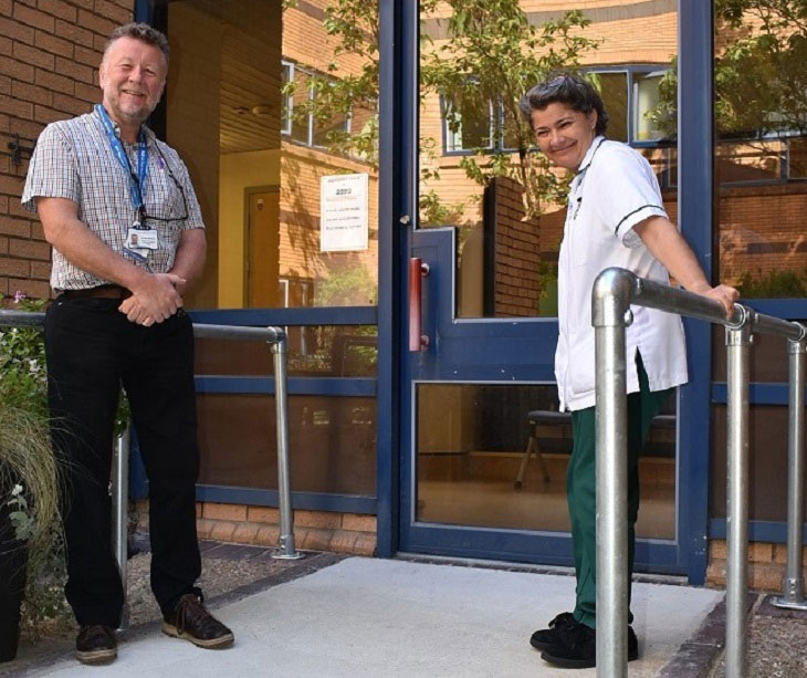 Harry Walmsley Chairman of Friends of Eastbourne Hospital and Rosy Shrubbs Clinical Lead Occupational Therapist by new ramp