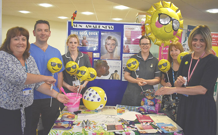 Dermatology team promote sun awareness. Julie Smithson - Macmillan Dermatology Clinical Nurse Specialist (3rd from right)