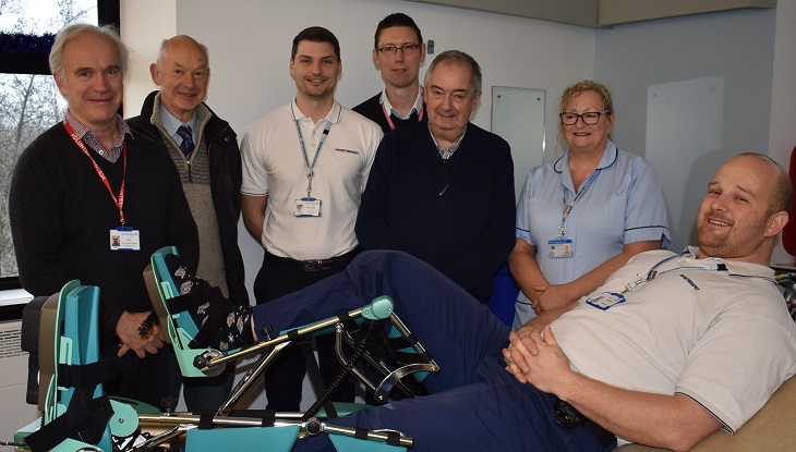 Bill Hamilton, Chairman of the Friends of Conquest Hospital with physiotherapy team 