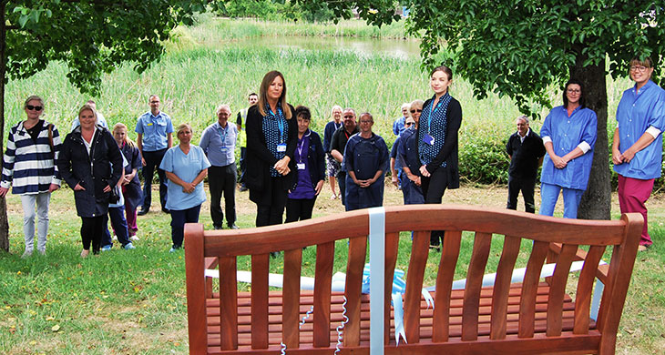The donated bench with Conquest staff and representatives of Kings Family Butchers