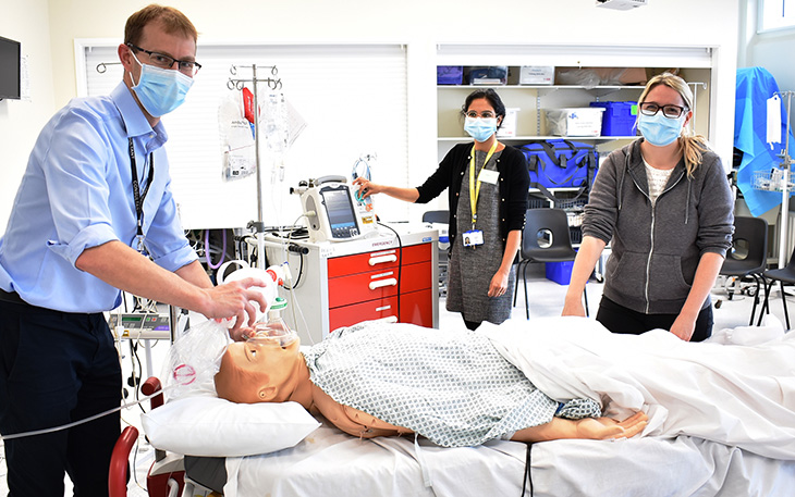 Dr Andrew Marshall, Consultant Cardiologist with specialist cardiac doctors undertaking simulation training