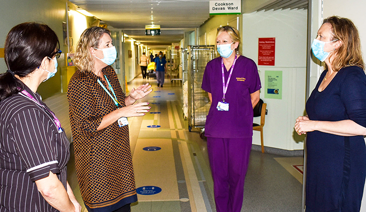 Sally-Ann Hart, MP for Hastings and Rye speaking with Conquest staff and Joe Chadwick-Bell