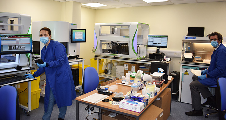 Pathology staff working with the new Covid testing machines