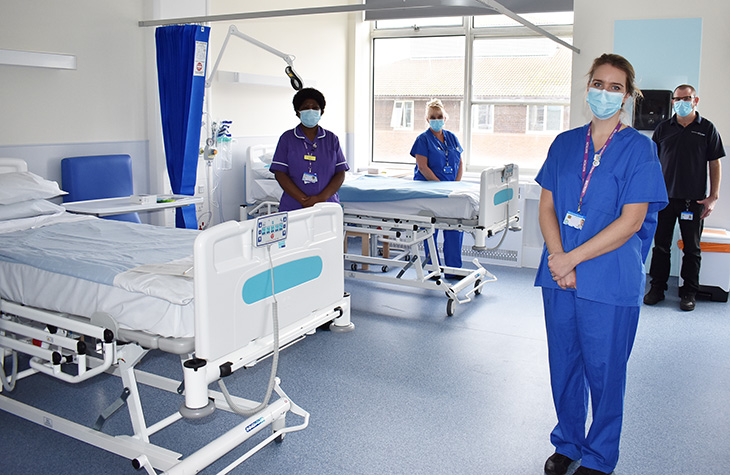 Members of Staff preparing the refurbished ward for opening 