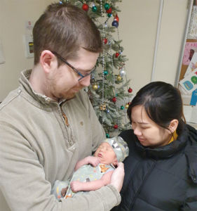 Baby Edward with Mum Hiep and Dad Stuart