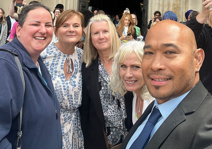 Beata Nagy - Housekeeper, Iwona Ward - Pharmacy Lead for Stroke, Debbie Discala - 2WW Colorectal Faster Diagnosis Nurse, Charlie Gepilga - Uro-oncology Cancer Support Worker, Michelle Bridger - Professional Nurse Advocate, pose outside Westminster Abbey
