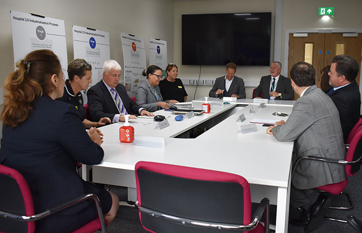 Lord Markham speaking to executives from the trust