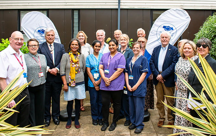Members of the Friends of Conquest Hospital, Sarah Kowitz DL, Chair of the Friends, Mr Graham Peters, Vice Lord-Lieutenant, John Wright together with colleagues from the special care baby unit.