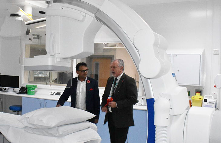 Trust Chairman, Steve Phoenix, is shown the new cath lab by Professor Nik Patel