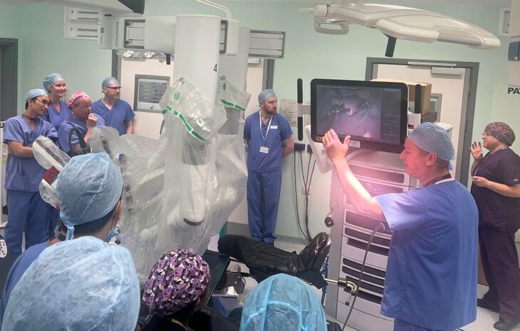 The surgical team being demonstrated the da Vinci XI robotic-assisted surgical system