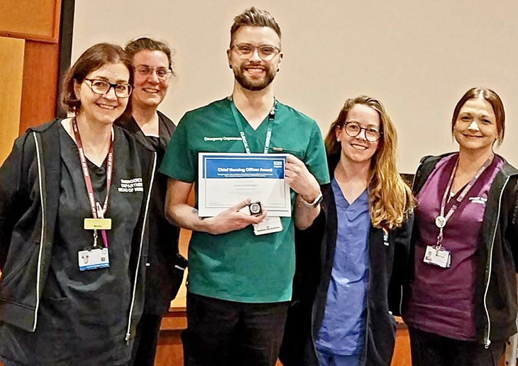 Daniel Guakrodger, Critical Care Technician with colleagues