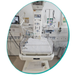 A photo of a some hospital equipment which is a maternity resuscitaire.