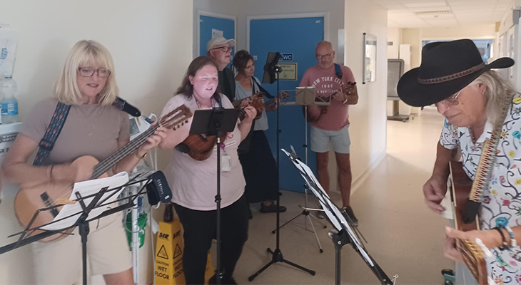 Ukulele band playing in a ward at Eastbourne DGH